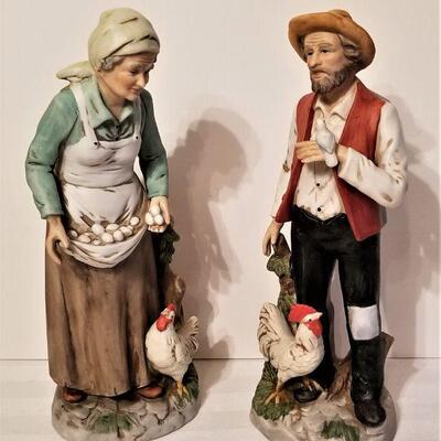 Lot #92  Pair of Bisque Porcelain Figurines - farmer and wife