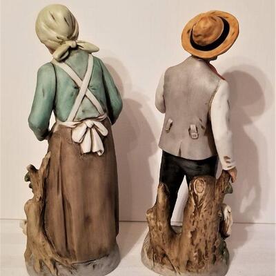 Lot #92  Pair of Bisque Porcelain Figurines - farmer and wife