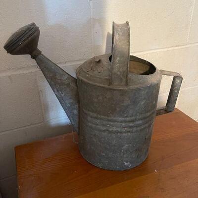 vintage galvanized water can 