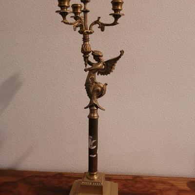 Lot 289: BOMBAY Brass Angel Candelabra (has a label on it- can be removed) 