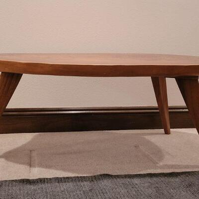 Lot 292: Mid Century Modern Planed Coffee Table (has a small ding in the varnish) 44.5" Ã— 22.5" Ã— 17" 