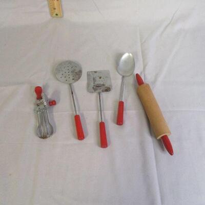 Lot 106 - Red Handle Child's Cooking Set