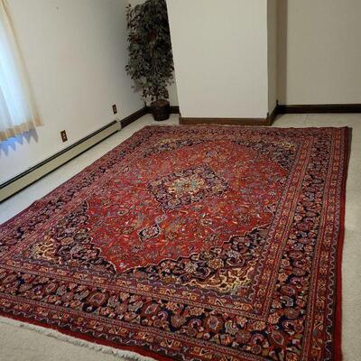 Lot 298: KASHAN Persian Rug 12' 8" Ã— 9' 7" (has some wear consistent with age)