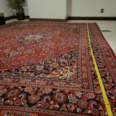 Lot 298: KASHAN Persian Rug 12' 8" Ã— 9' 7" (has some wear consistent with age)