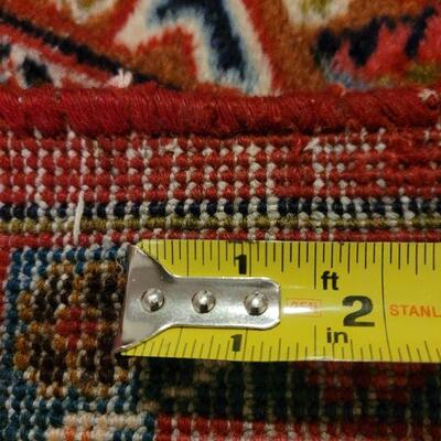 Lot 298: KASHAN Persian Rug 12' 8" Ã— 9' 7" (has some wear consistent with age)