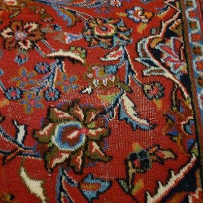 Lot 298: KASHAN Persian Rug 12' 8" Ã— 9' 7" (has some wear consistent with age)