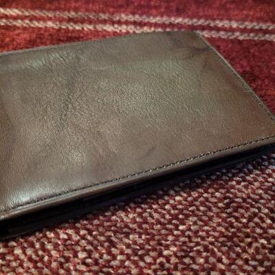 Lot 303: Assortment of Vintage Men's Leather Wallets 