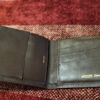 Lot 303: Assortment of Vintage Men's Leather Wallets 