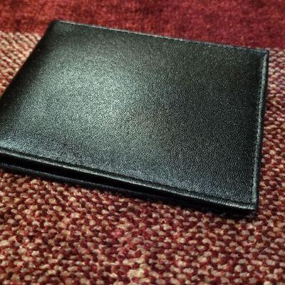 Lot 303: Assortment of Vintage Men's Leather Wallets 