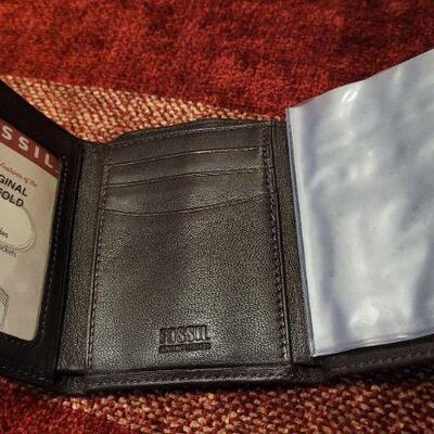 Lot 303: Assortment of Vintage Men's Leather Wallets 