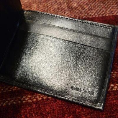 Lot 303: Assortment of Vintage Men's Leather Wallets 