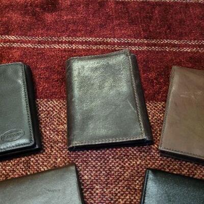 Lot 303: Assortment of Vintage Men's Leather Wallets 