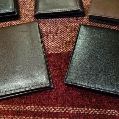 Lot 303: Assortment of Vintage Men's Leather Wallets 