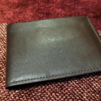 Lot 303: Assortment of Vintage Men's Leather Wallets 
