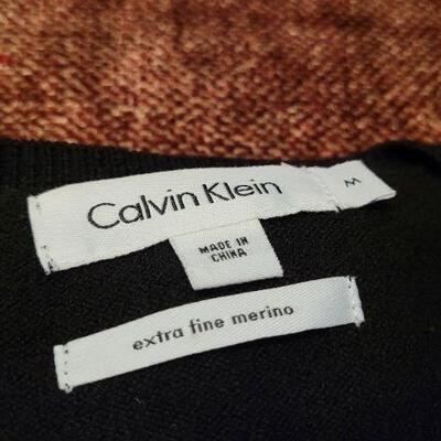 Lot 320: (2) Pre Owned CALVIN KLEIN Size Large & Medium Extra Fine Merino Wool Sweaters