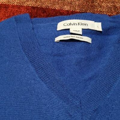 Lot 320: (2) Pre Owned CALVIN KLEIN Size Large & Medium Extra Fine Merino Wool Sweaters