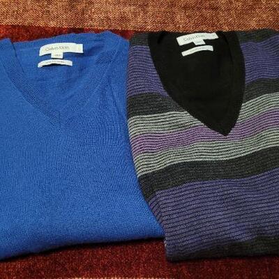 Lot 320: (2) Pre Owned CALVIN KLEIN Size Large & Medium Extra Fine Merino Wool Sweaters