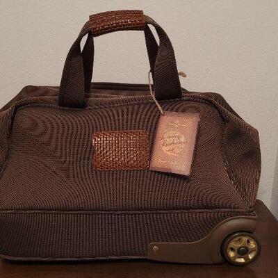 Lot 406: New TOMMY BAHAMA Wheeled Carry On Travel Bag