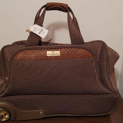 Lot 406: New TOMMY BAHAMA Wheeled Carry On Travel Bag