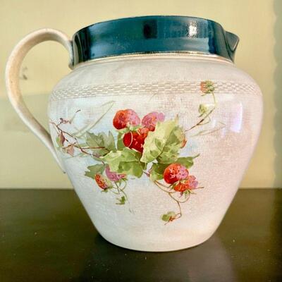 LOT 46  ANTIQUE ROUNDED PITCHER WITH STRAWBERRY MOTIF