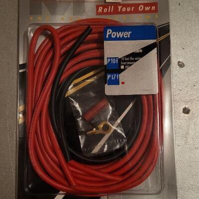 Lot 464: MONSTER CABLE Amp Wiring Kit 