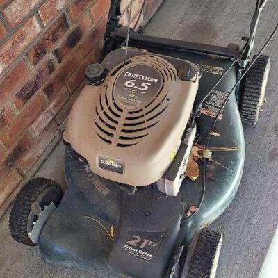 Lot 476: CRAFTSMAN 21" 6.5 Horsepower Single Drive Mulching Lawnmower w/ Bag