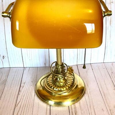 LOT 66   REPRODUCTION BRASS DESK LAMP AMBER GLASS SHADE