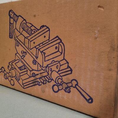 Lot 516: 4" Cross Vice NEW IN BOX