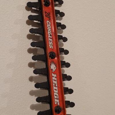 Lot 553: Black and Decker 20" Cordless Hedge Trimmer CHT500 (No Battery) 
