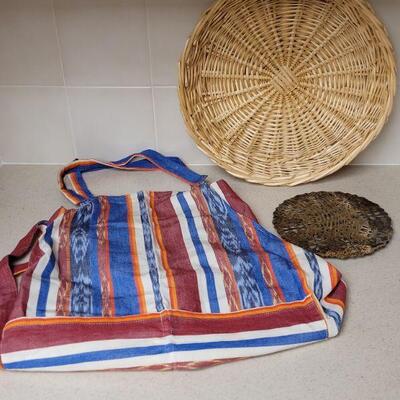 Lot 576: Apron, Large Basket Plate and Metal Trivet