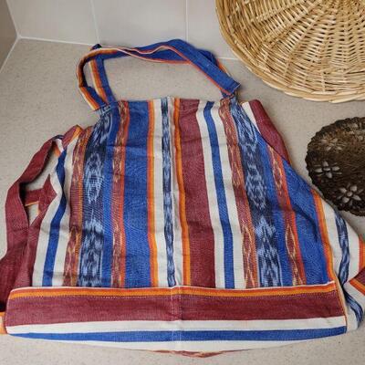 Lot 576: Apron, Large Basket Plate and Metal Trivet