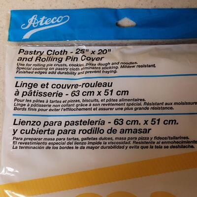 Lot 577: Baking Roll Pat, Freezer Wrap, Plastic Cups and Pastry Cloth 