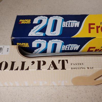 Lot 577: Baking Roll Pat, Freezer Wrap, Plastic Cups and Pastry Cloth 