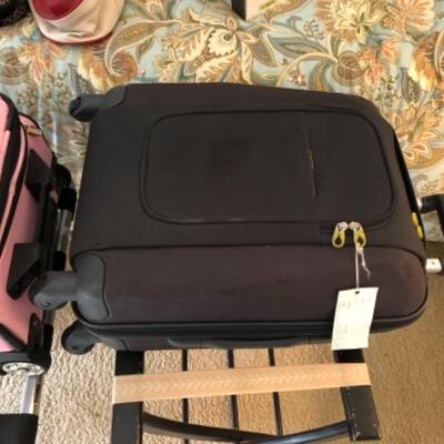 Lot 19. Travel Accessories: Two carry-ons, luggage scale, 5 cosmetic bags, 2 laundry bags, 2 luggage racks, memory foam travel...