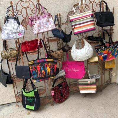 Lot 20. 26 assorted hand bags (cross-body, clutches, totes, etc. (some designer)--WAS $95–NOW $71.25