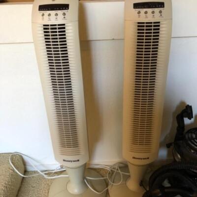 Lot 44. Two Honeywell oscillating standing fans with remote; one Filterqueen canister vacuum with attachments--WAS $195 â€”NOW $146.25