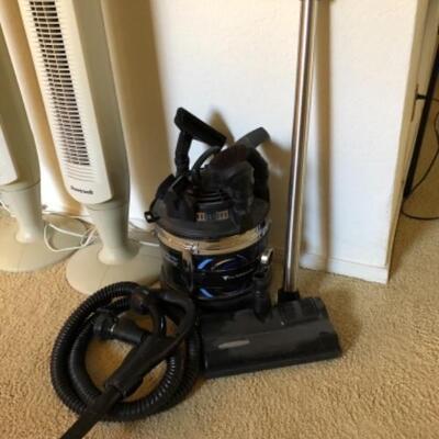 Lot 44. Two Honeywell oscillating standing fans with remote; one Filterqueen canister vacuum with attachments--WAS $195 â€”NOW $146.25