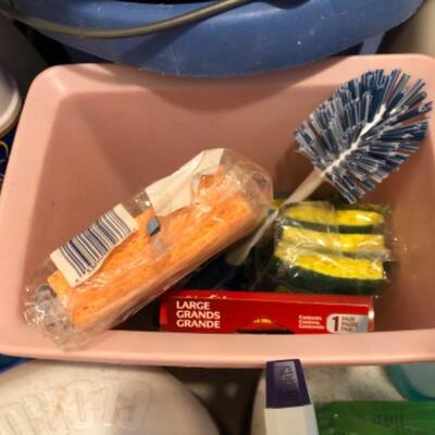 Lot 57. Large assortment of cleaning products, sponges, cloths, glasses, brushes, etc.--WAS $30â€“NOW $22.50