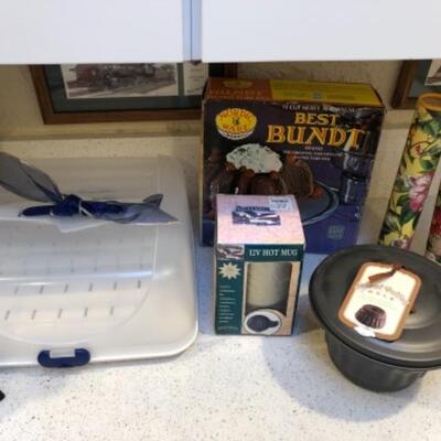 Lot 60.  Kitchen accessories, baking pans and racks, cheese grater, fireplace matches, etc.--WAS $65â€“NOW $48.50