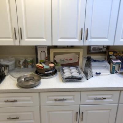 Lot 60.  Kitchen accessories, baking pans and racks, cheese grater, fireplace matches, etc.--WAS $65â€“NOW $48.50