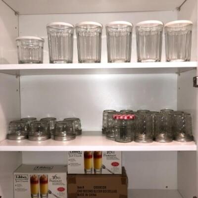Lot 62. Plastic storage containers, water bottles, glassware, pitchers, plastic wine glasses, Ball jar funnel, Ball jars w/lids,...