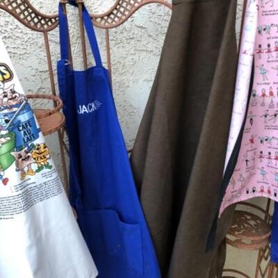 Lot 70. Eight aprons--WAS $35â€“NOW $26.25