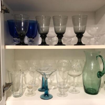 Lot 76. Large assortment of stemware and pitchers--WAS $55â€“NOW $41.25