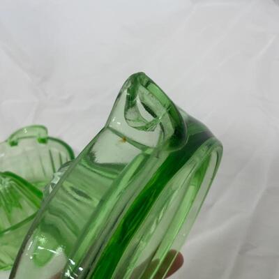 .50. Two Green Depression Glass Reamers