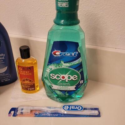 Lot 631: Soap, Lotion, Jojoba Oil, Mouthwash, Toothbrush and Pill Organizer