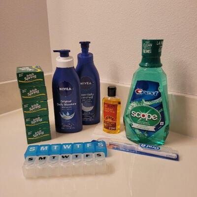 Lot 631: Soap, Lotion, Jojoba Oil, Mouthwash, Toothbrush and Pill Organizer