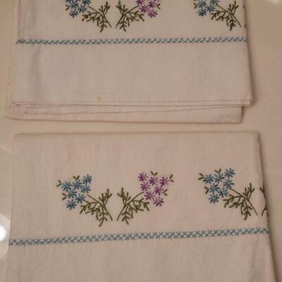 Lot 653: Vintage Needlepoint Pillowcases and Table Runner