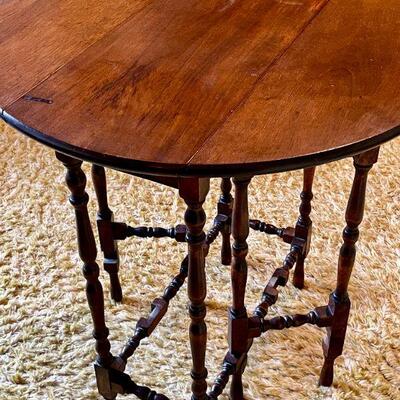 LOT 95  ANTIQUE WALNUT DROP LEAF GATE LEG TABLE AS IS BURN MARK
