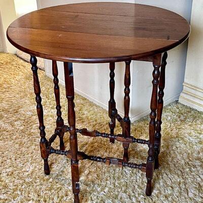 LOT 95  ANTIQUE WALNUT DROP LEAF GATE LEG TABLE AS IS BURN MARK