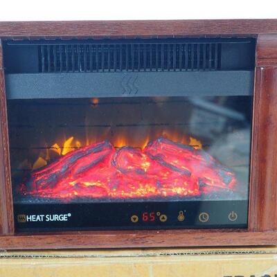 Lot 51  New Heat Surge electric fireplace